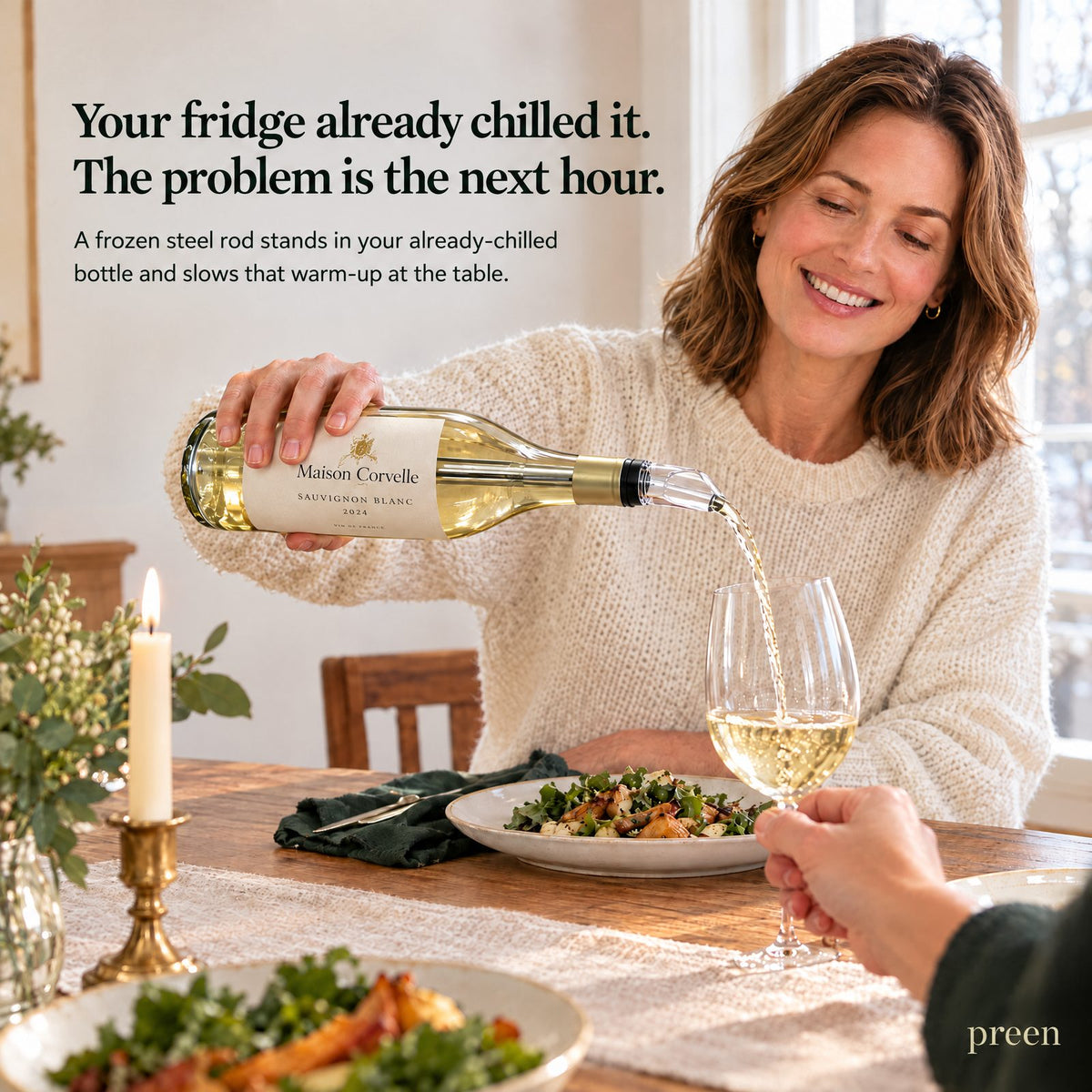 Pouring white wine through Preen Keeper at dinner